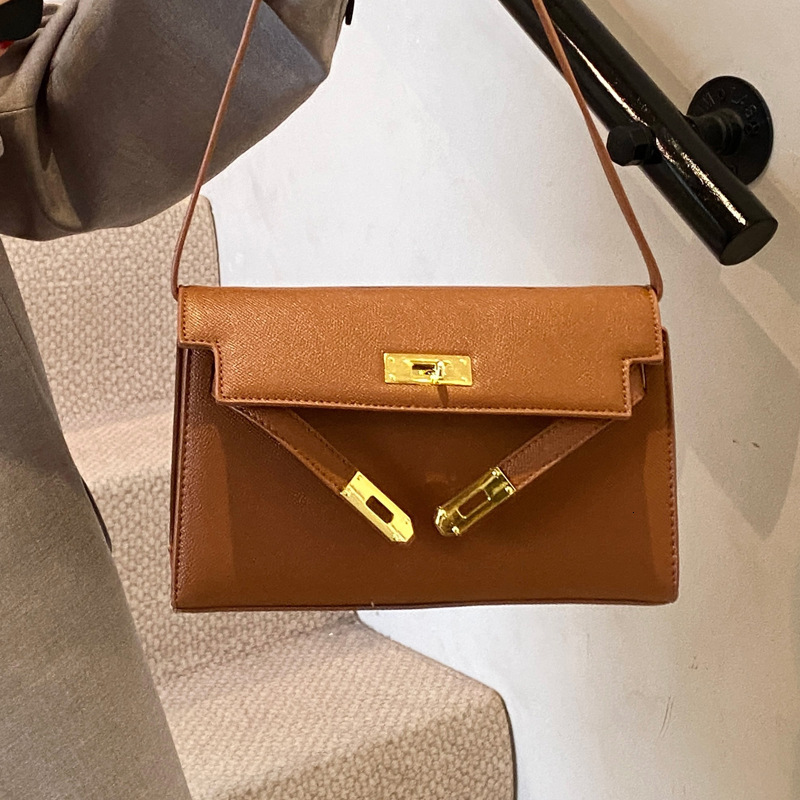 2025S Designer Women S Bag Light Luxury Texture Handbag Women S New Kelly Simple And Versatile Commuting Small Square Bag Single Shoulder Armpit Bag