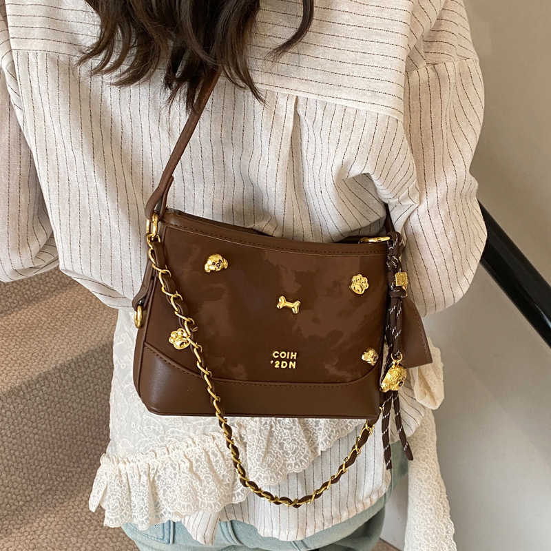 2025S Designer Women S Bag Niche Design Bow Shoulder High End Minimalist Crossbody Bag Fresh Girl Armpit Bucket Bag
