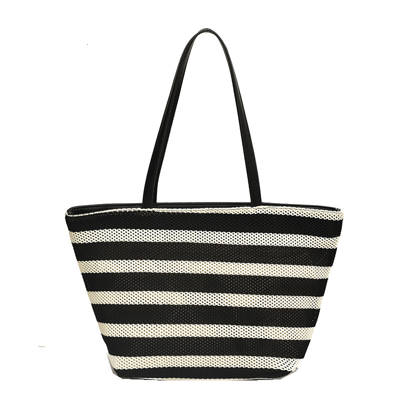 2025S Designer Women S Bag Korean Version Capacity Single Shoulder Women S New Spliced Contrasting Large Autumn Hollow Weave Lazy Style Tote Bag