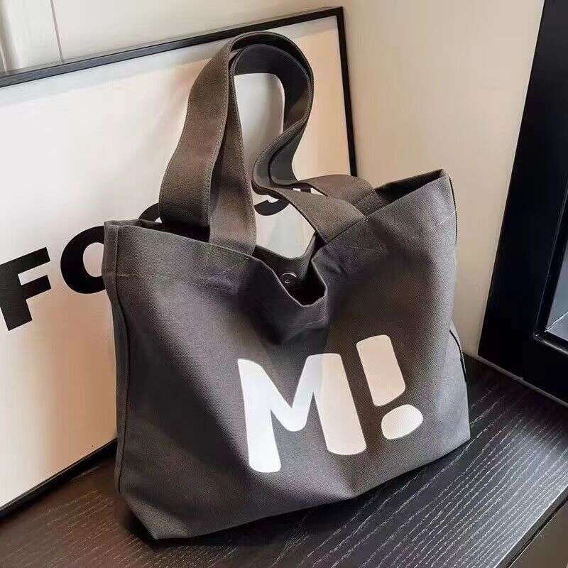 Canvas for women, large capacity, sturdy supermarket shopping bag, simple and versatile. 2024 new single shoulder tote bag