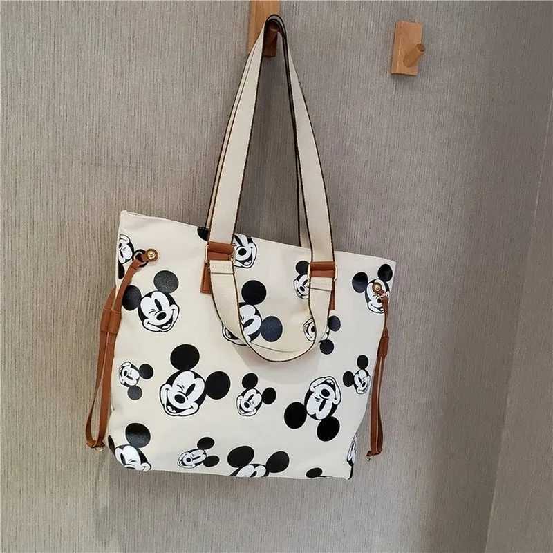 Disney joint brand Mickey Fashion Womens Shoulder Bag Large Capacity Multi Functional Storage Bag High Quality Womens HandbagXJ250412