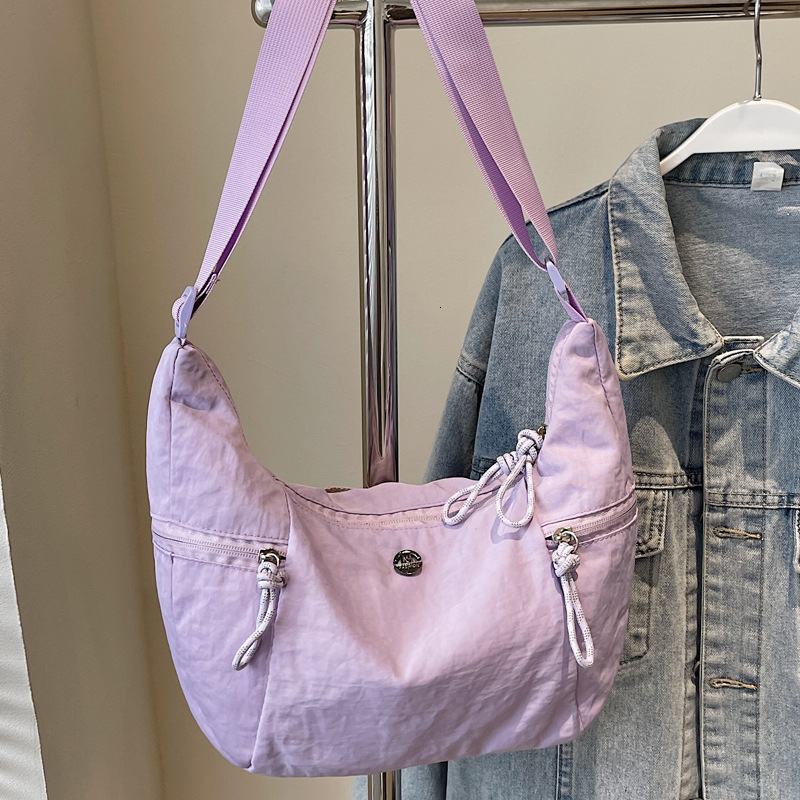 2025S Designer Women S Bag Nylon Cloth Spring New Versatile Women S Single Shoulder Crossbody Lightweight Casual Street Travel Dumpling Bag