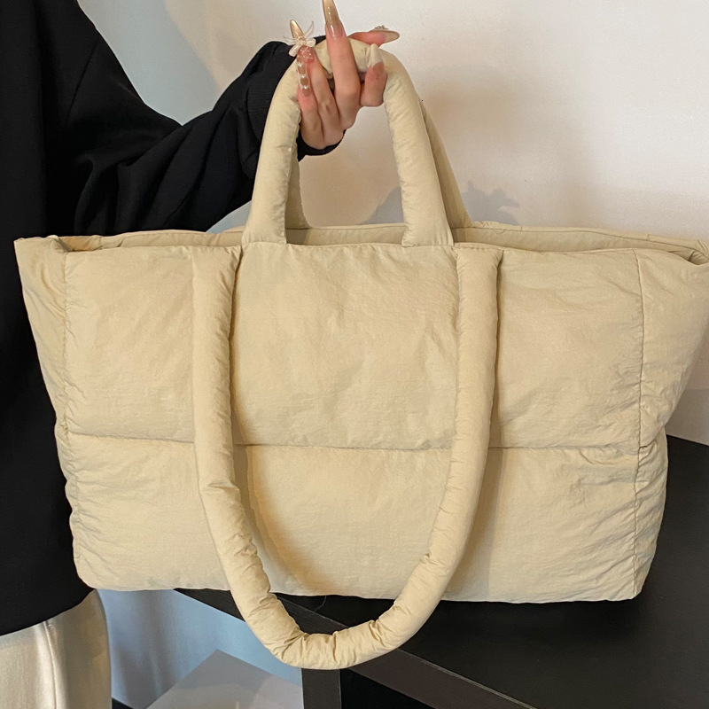 2025S Designer Women S Bag Women S New Cotton Down Jackets Niche South Korean Space Bags One Shoulder Tote Oversized Bags Popular This Year