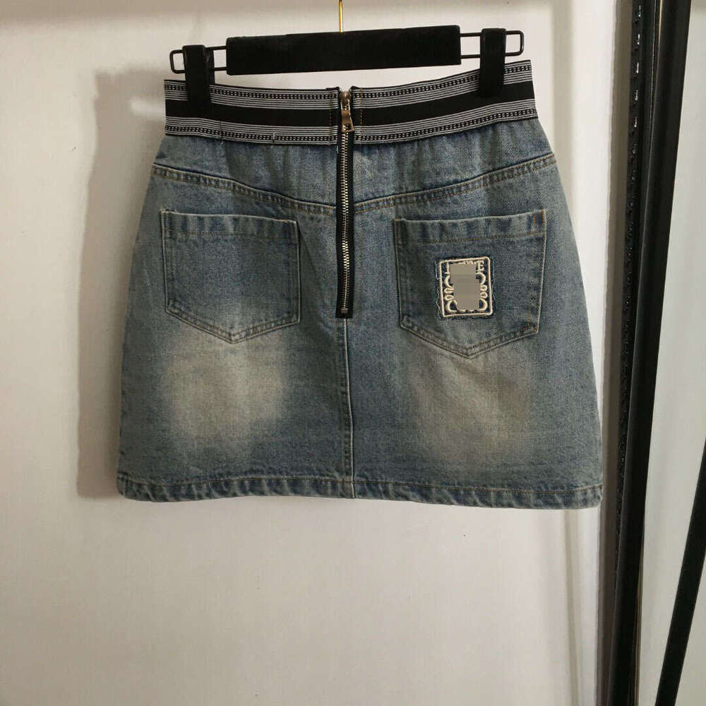 Designer clothing 2025 New Hot Selling Fashionable Embroidered Patchwork Ribbon Versatile Elastic Waist A-line Cowboy Short Half Skirt