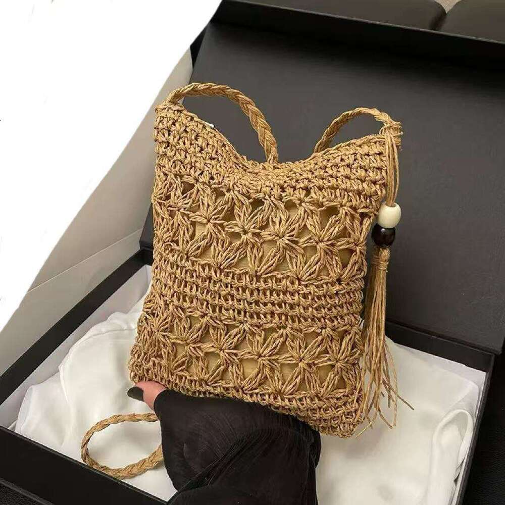 Handmade Beach Bag Handmade Woven One Shoulder Versatile Artistic Hollow Out Niche Tassel Mobile Phone Bag With High Aesthetic Value Crossbody Kq2