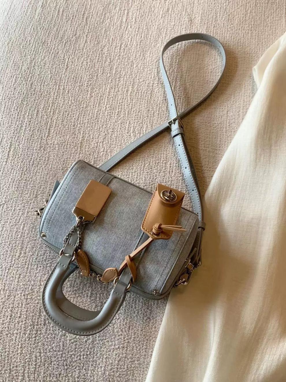 High-value French-style handheld Boston bag for women. New denim single-shoulder cross body bag Popular pillow bag