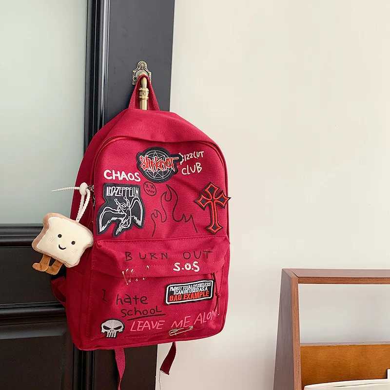 Gothic Rock Backpack For Men And Women Large Capacity Canvas Casual Backpack With Metal Patchwork Accents for Daily UseW251113