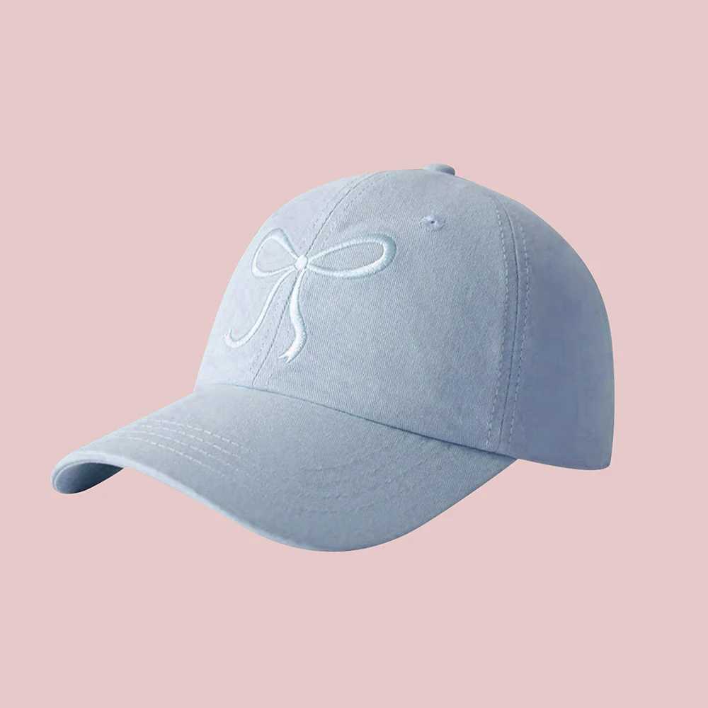 Wearing a small fresh and cute womens duckbill hat with a bow and baseball cap throughout the four seasons outdoor sports sun protection hat W250414
