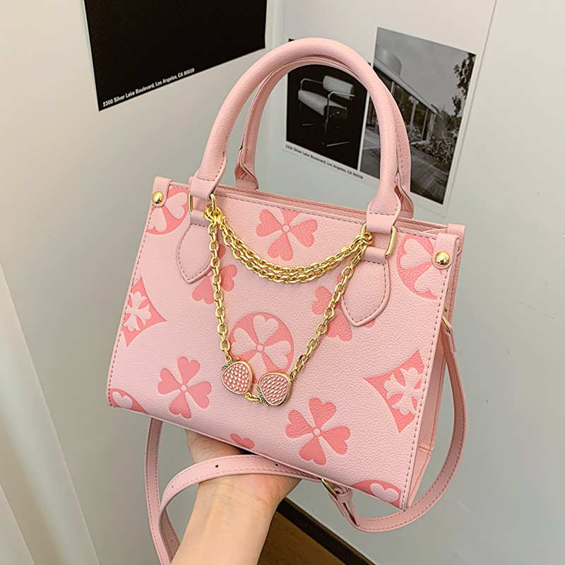 2025 Women's old flower handbag new style fashionable embossed shoulder small square bag high-end sense versatile for commuting cross body bag