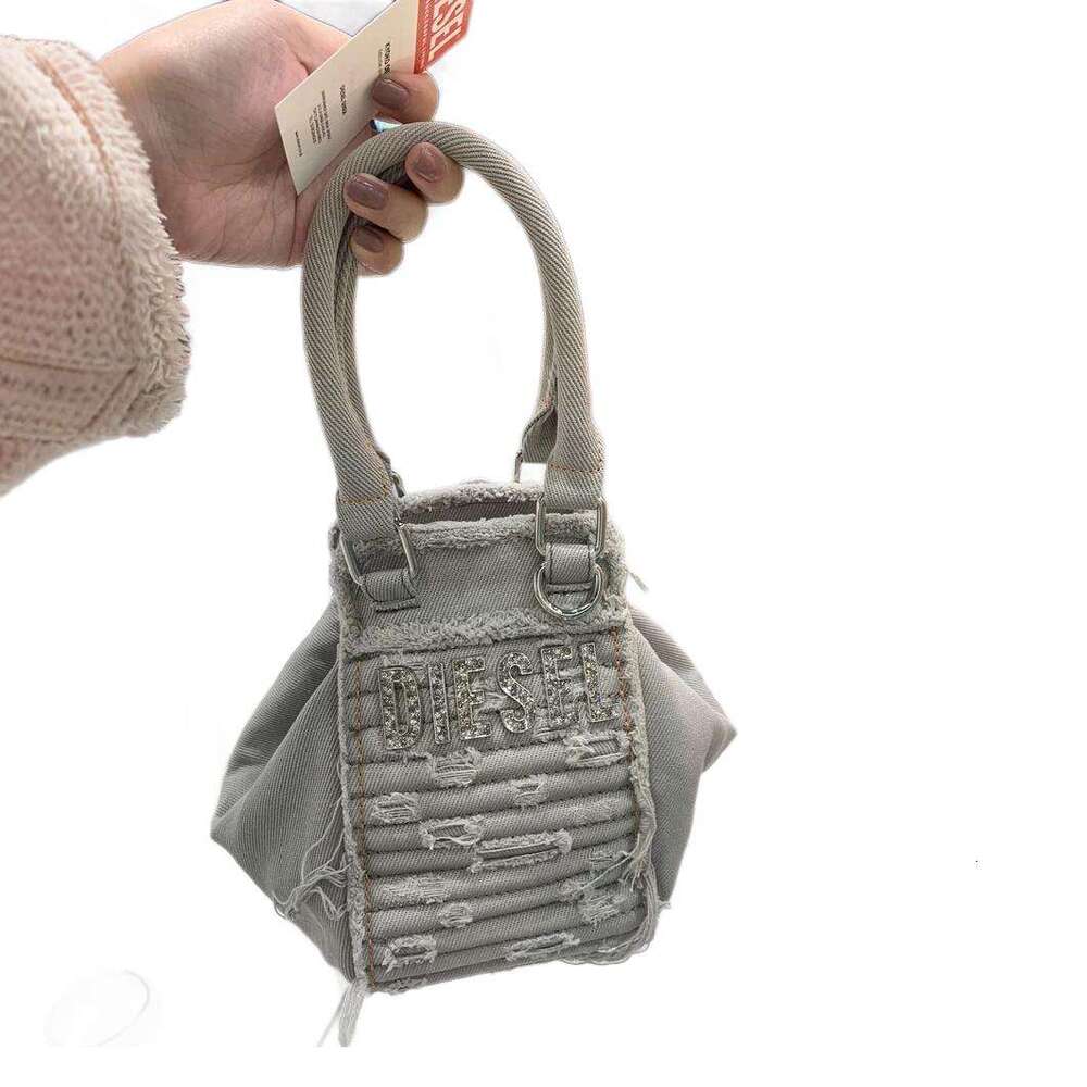 Women's Bags New denim embroidered letter handbag for women with high looks, single shoulder tassel bag, niche tote