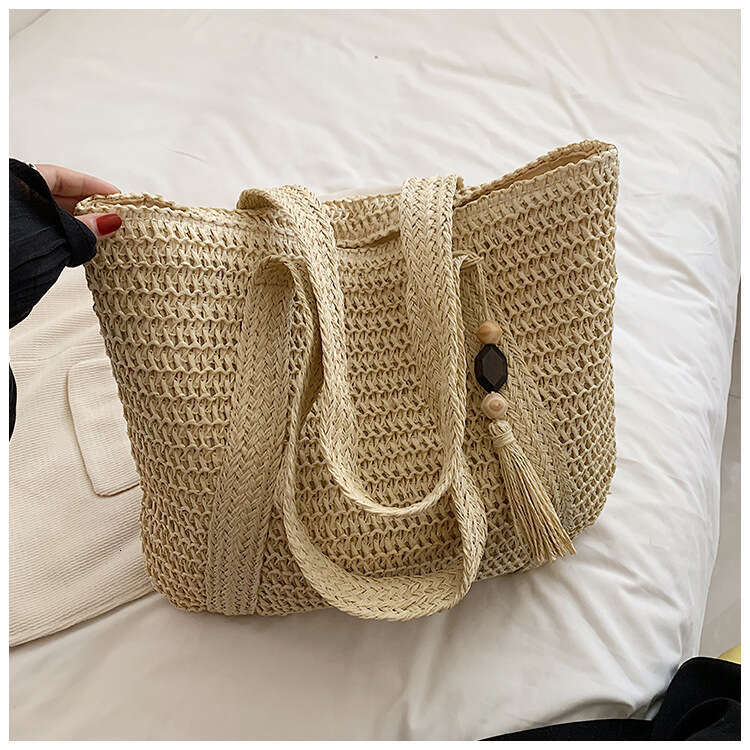 Handmade Beach Bag Women's Simple Large Capacity Lightweight Bucket Beach Trendy Grass Woven New Hand-Held Shoulder Bag Kq2