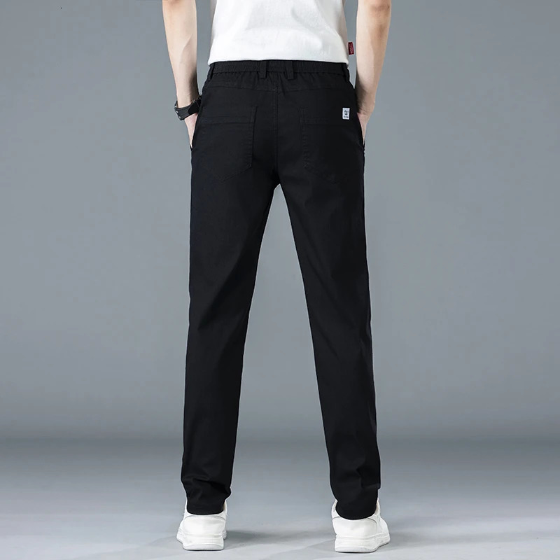 Mens slim fit straight casual pants for spring and summer solid color Korean elastic business cotton mens 250414Z