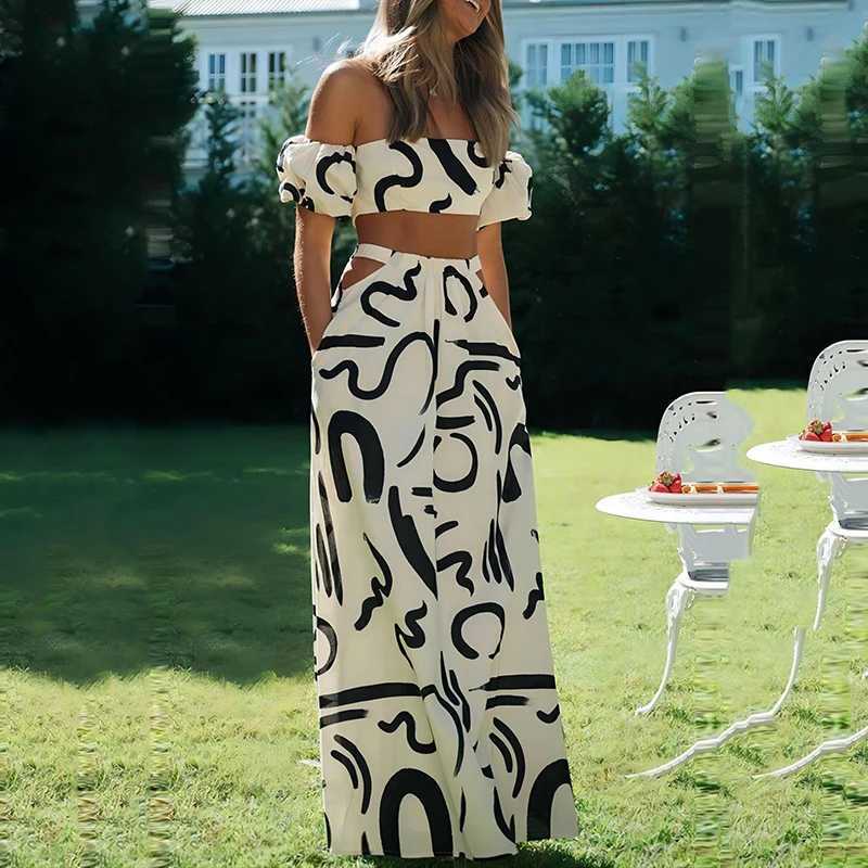 Two piece fashionable new printing solid color foam Sve zipper breast packaging crop top and hollow waist big hem dress for womenXJ250414