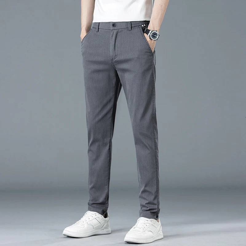 Mens slim fit straight casual pants for spring and summer solid color Korean elastic business cotton mens 250414Z