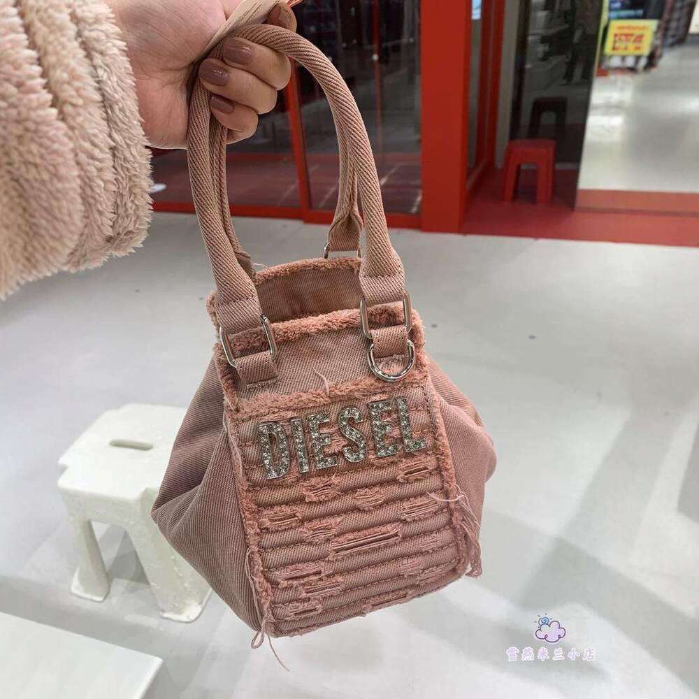 Women's Bags New denim embroidered letter handbag for women with high looks, single shoulder tassel bag, niche tote