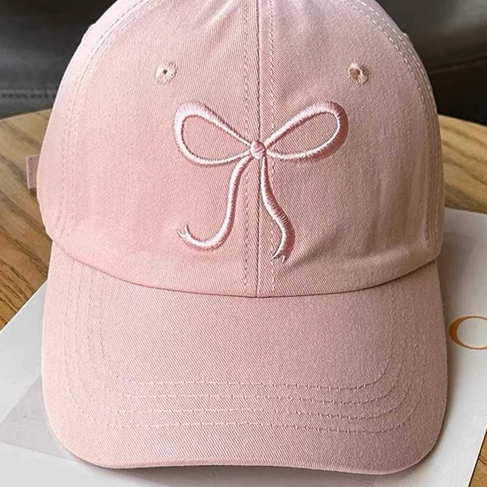 Wearing a small fresh and cute womens duckbill hat with a bow and baseball cap throughout the four seasons outdoor sports sun protection hat W250414
