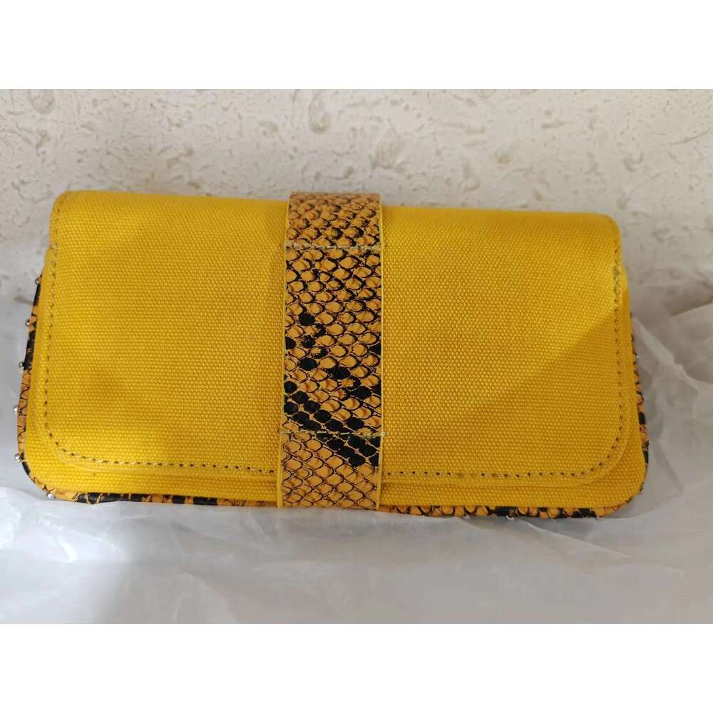 2024 New Canvas Patchwork Leather Fashionable And Trendy Commuting Mini Phone Bag