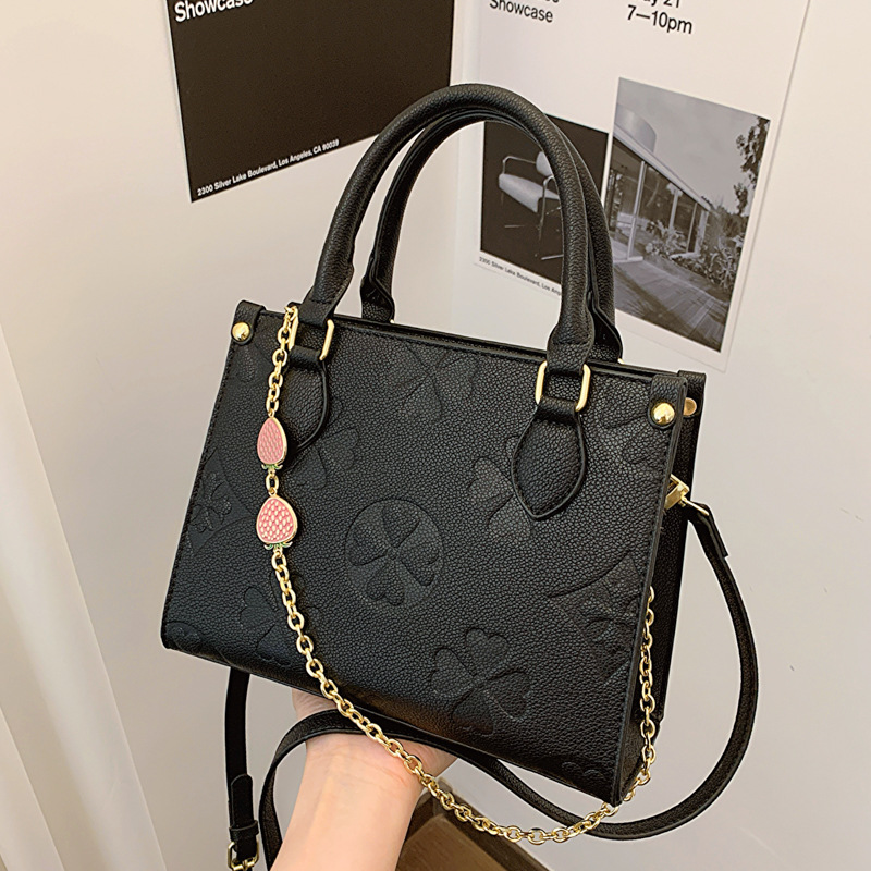 2025 Women's old flower handbag new style fashionable embossed shoulder small square bag high-end sense versatile for commuting cross body bag