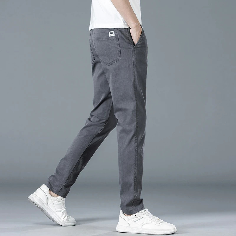 Mens slim fit straight casual pants for spring and summer solid color Korean elastic business cotton mens 250414Z