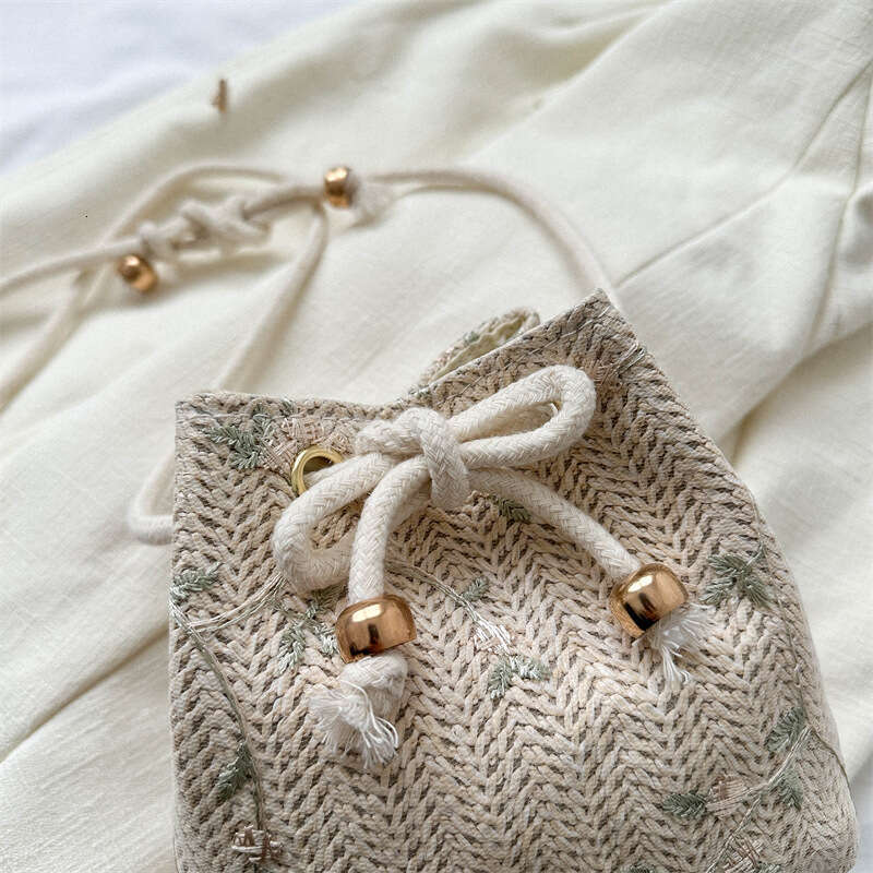 Handmade Beach Bag Woven Women's New Trend 2023 Summer Grass Weaving Cute Fairy Small Fresh Bucket Personality Single Shoulder Crossbody Bag Kq2