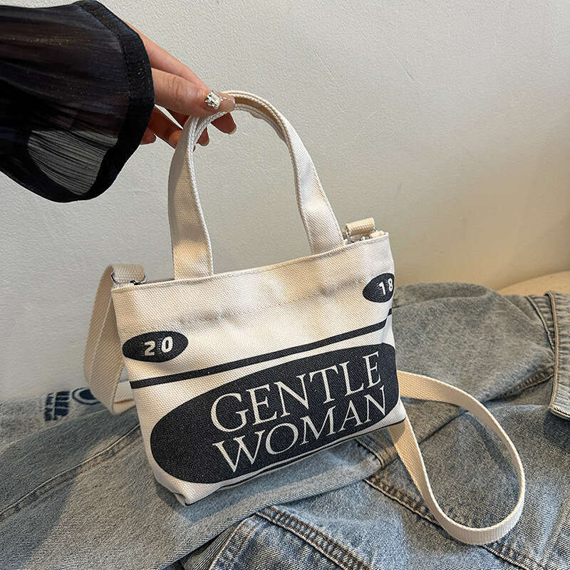 Thai internet celebrity GW letter hand-held small square bag trendy new style fashionable and versatile canvas print single shoulder crossbody coin pu