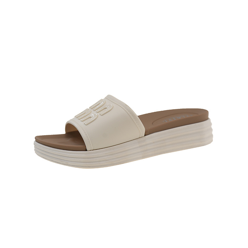 designer slippers new Women's fashionable thick-soled mid-heel one-word slippers versatile and non-slip beach slippers for women