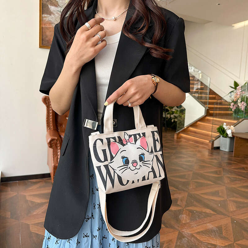 Thai internet celebrity GW letter hand-held small square bag trendy new style fashionable and versatile canvas print single shoulder crossbody coin pu