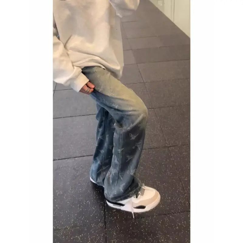 jacquard fully printed street fashion ned denim pants with a tactile feel suitable for mens loose straight and wide leg casual 250414