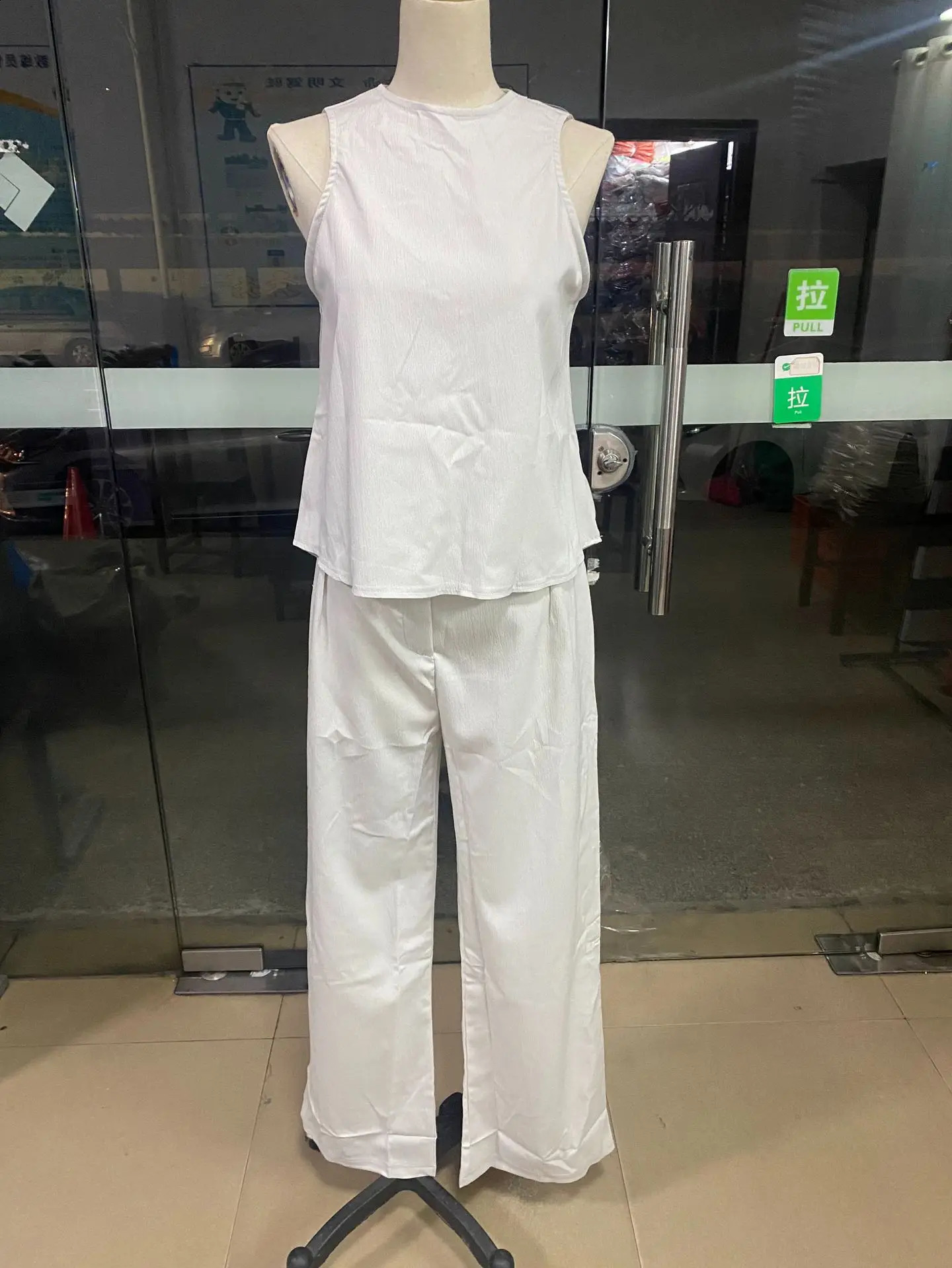 Elegant womens solid color two-piece summer loose sleeveless top high waisted wide leg pants Urban casual womens pants set 250414