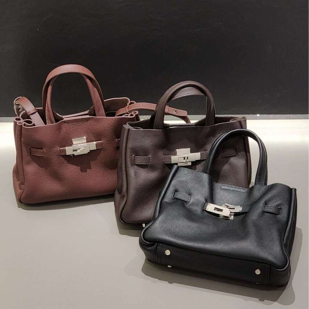 Top layer T cowhide high-end sensory communication crossbody simple hand-held shoulder large capacity bag, new model