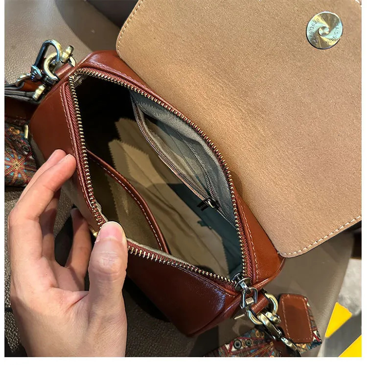 Cylindrical pillow leather womens handbag underwear bag fashionable Versatile womens Communicating shoulder cross body bag 250410