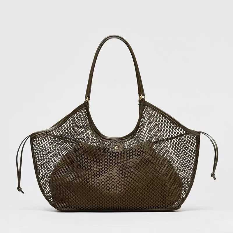 Designer womens mesh handbag large capacity womens commuting shoulder bag spring and summer new casual vacation lazy style handbag W250415