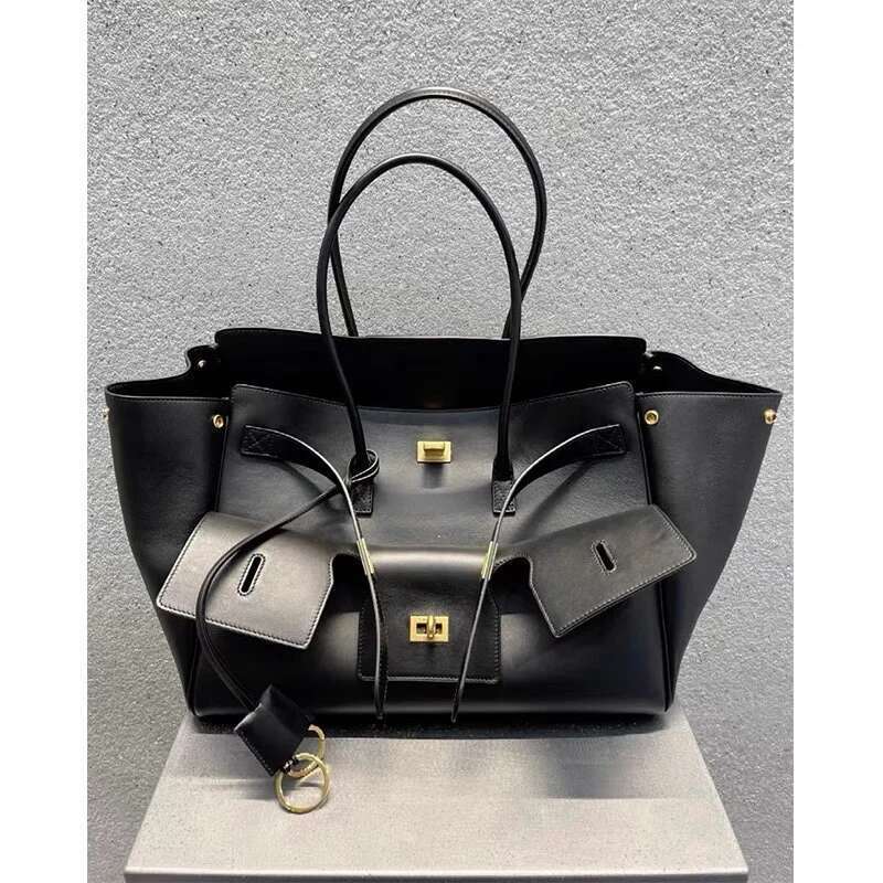 Designer Large Capacity Lock Tote Clutch Travel Genuine Leather Wing Handbag Female Shoulder dh1100029076 hot Bags Roomy Commuter Bag
