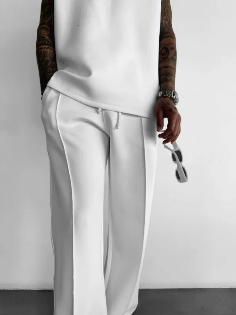 mens casual pants stylish and comfortable elastic waist drawstring single-line pleated solid color pocket mops pants 250415