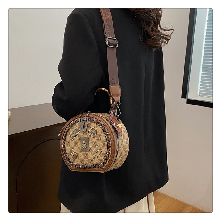 2025 High-end fashion women's small round bag new style Retro printed handbag Casual and versatile shoulder and cross body bag new design