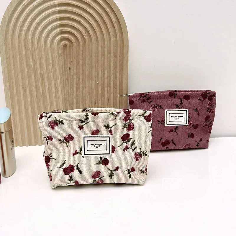 New small womens makeup bag floral pattern small sanitary napkin storage bag coin key box portable card bagXJ250415