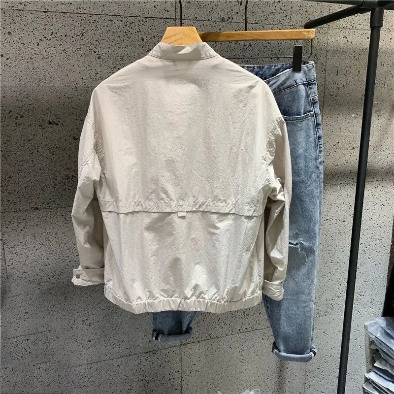 Beautiful mens Sunscreen summer clothing thin style loose fit fully matched standing collar pocket long sleeved zipper workwear jacket 250415