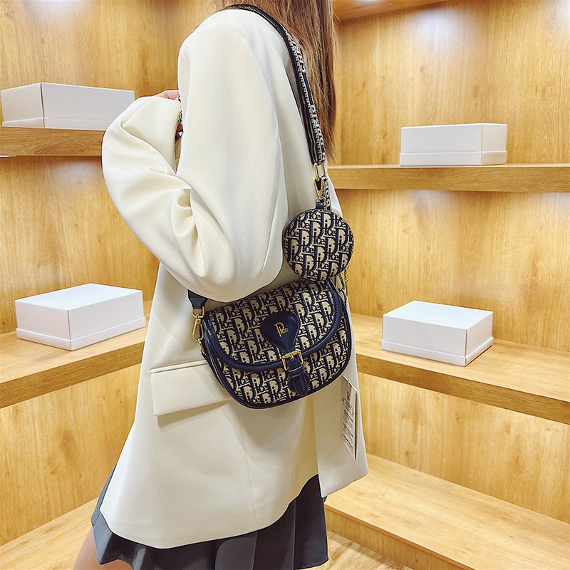 Designer bag free shipping 2025 new fashionable temperament saddle bag high-end printed shoulder crossbody bag for women