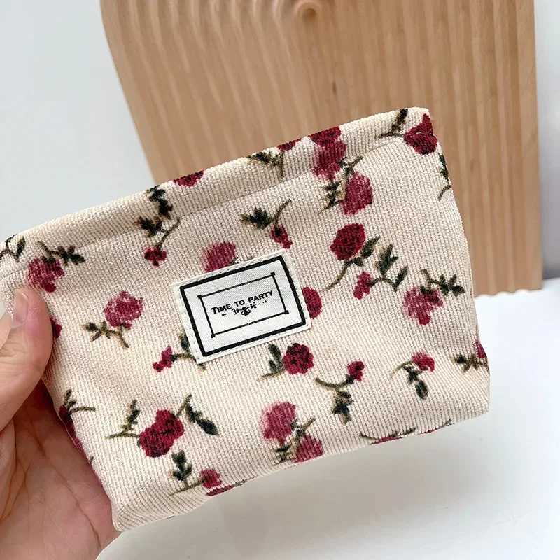 New small womens makeup bag floral pattern small sanitary napkin storage bag coin key box portable card bagXJ250415