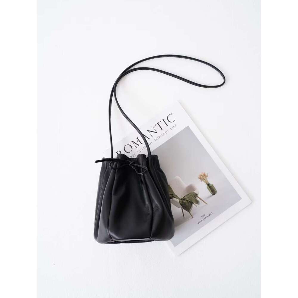Mm Women's Bags Early Spring Korean Niche Design Drawstring Bucket Casual Versatile Single Shoulder Diagonal Cross Sheepskin Women's Bag