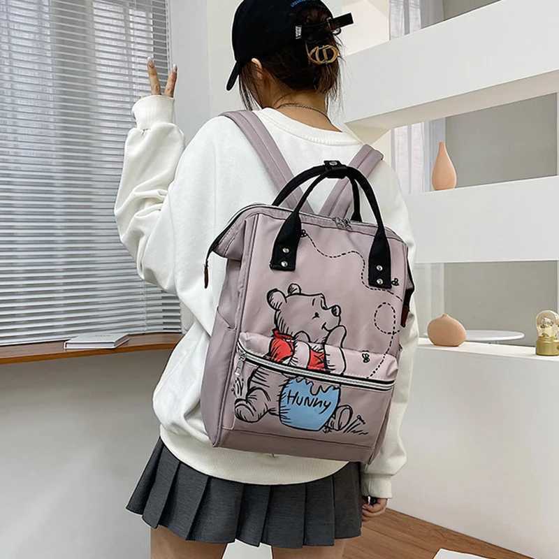 Disney Winnie The Pooh Backpack Anime Large Capacity Travel Mommy Bag Womens Backpack knapsack Cartoon kids schoolbag giftXJ250414