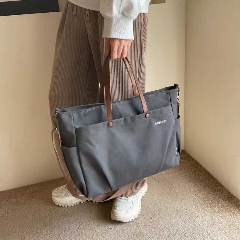 Canvas solid color casual cross body bag large capacity simple womens shoulder bag 2024 high-quality womens bag W250415