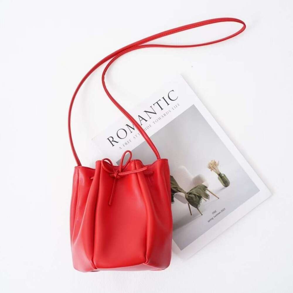 Mm Women's Bags Early Spring Korean Niche Design Drawstring Bucket Casual Versatile Single Shoulder Diagonal Cross Sheepskin Women's Bag