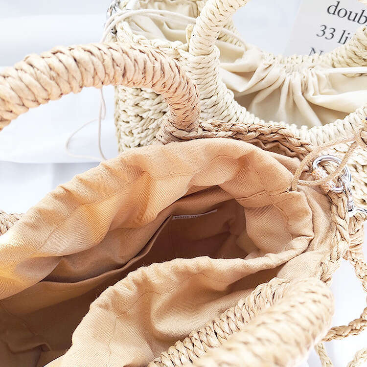 Handmade Beach Bag New Paper Rope Fashion Versatile Hand-Held Crossbody Small Round Bucket Hand Grass Woven Bag Kq2