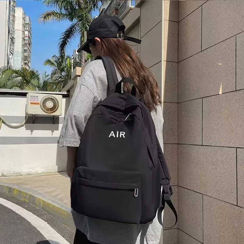 Neutral style backpack for men and women suitable for travel and school use With a letter-print designW251114