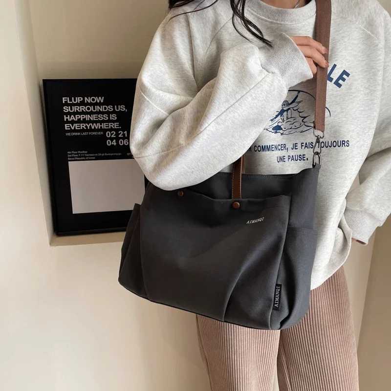 Canvas solid color casual cross body bag large capacity simple womens shoulder bag 2024 high-quality womens bag W250415
