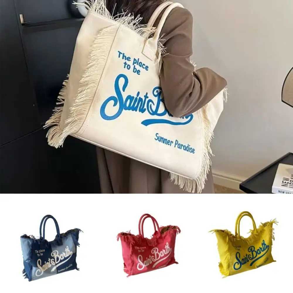 Fashion tassel design womens canvas large capacity high-quality casual shoulder bag INS letter canvas handbag vacation W250415