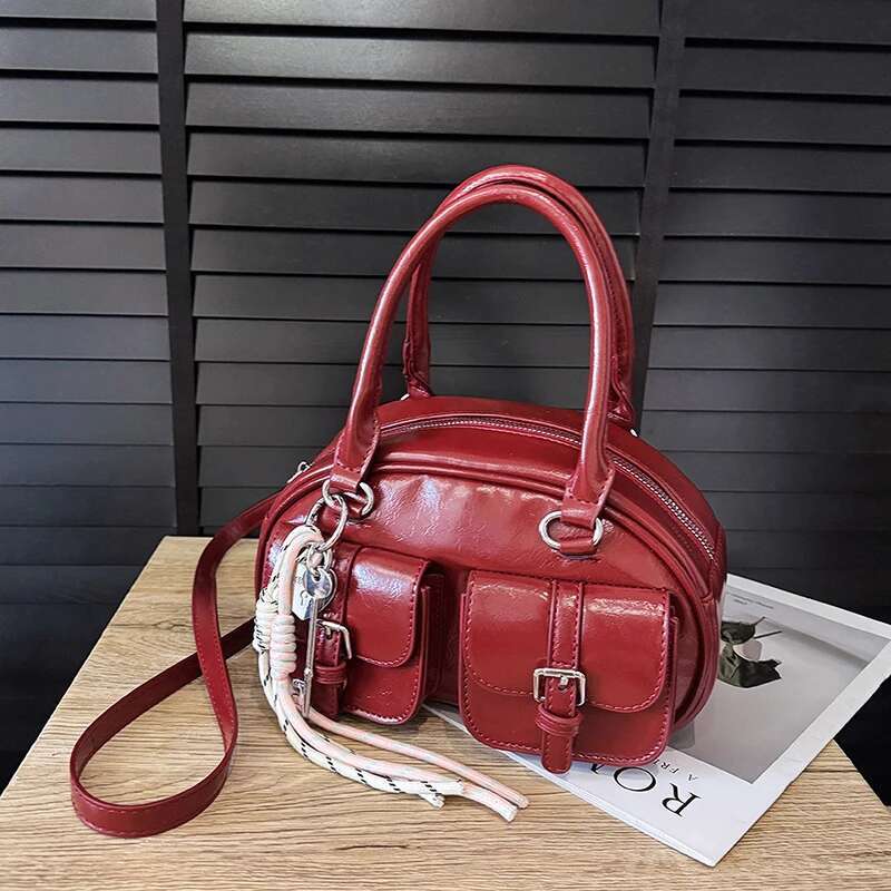 Brand Multi-Pocket Bowg Lady Batik Handbag Leather Buckle Design Shoulder Versatile Crossbody Bag