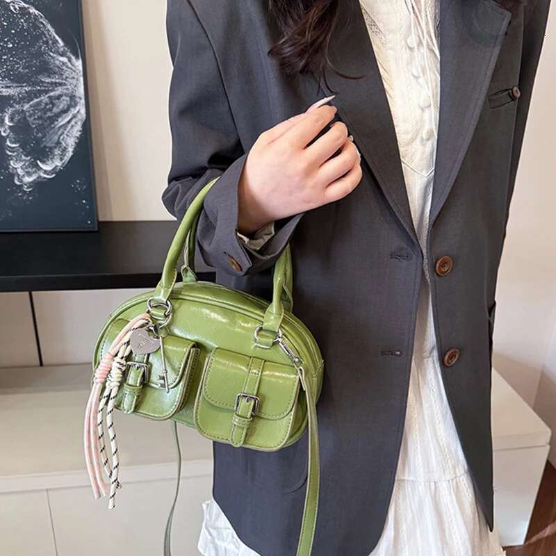 Brand Multi-Pocket Bowg Lady Batik Handbag Leather Buckle Design Shoulder Versatile Crossbody Bag