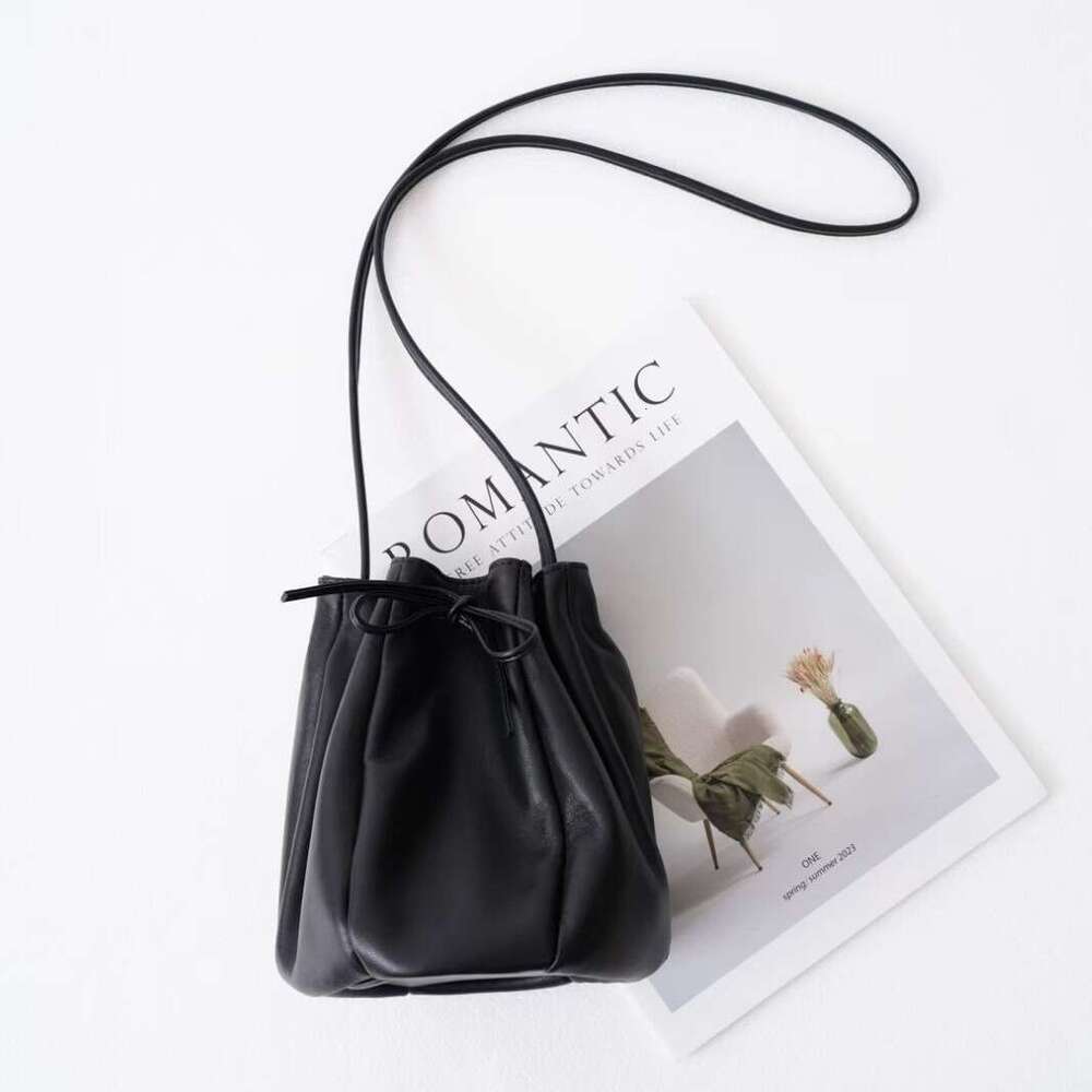 Mm Women's Bags Early Spring Korean Niche Design Drawstring Bucket Casual Versatile Single Shoulder Diagonal Cross Sheepskin Women's Bag